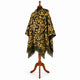 Gold and olive camo alpaca wool poncho – three-quarter view on a mannequin showing the hood, button neck and fringed hem