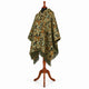 Sage and rust camo alpaca wool poncho – three-quarter view on a mannequin showing the hood, button neck and fringed hem