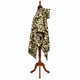 Camo alpaca wool poncho – side profile on a mannequin showing the hood and how the poncho drapes over the arm
