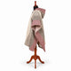 Cream and burgundy striped hooded poncho on a mannequin, side