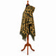 Gold and olive camo alpaca wool poncho – side profile on a mannequin showing the hood and drape over the arm