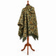 Sage and rust camo alpaca wool poncho – rear three-quarter view on a mannequin with the hood down the back