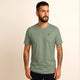 Man wearing 100% organic cotton premium unisex t-shirt, soft cotton blend, fair trade, Paramo Green logo sage green