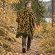 Camo Inti alpaca wool poncho – rear view on an autumn woodland walk showing the hood and dark olive fringe