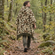 Camo Sacha alpaca wool poncho – rear view on a woodland walk showing the hood and fringed hem