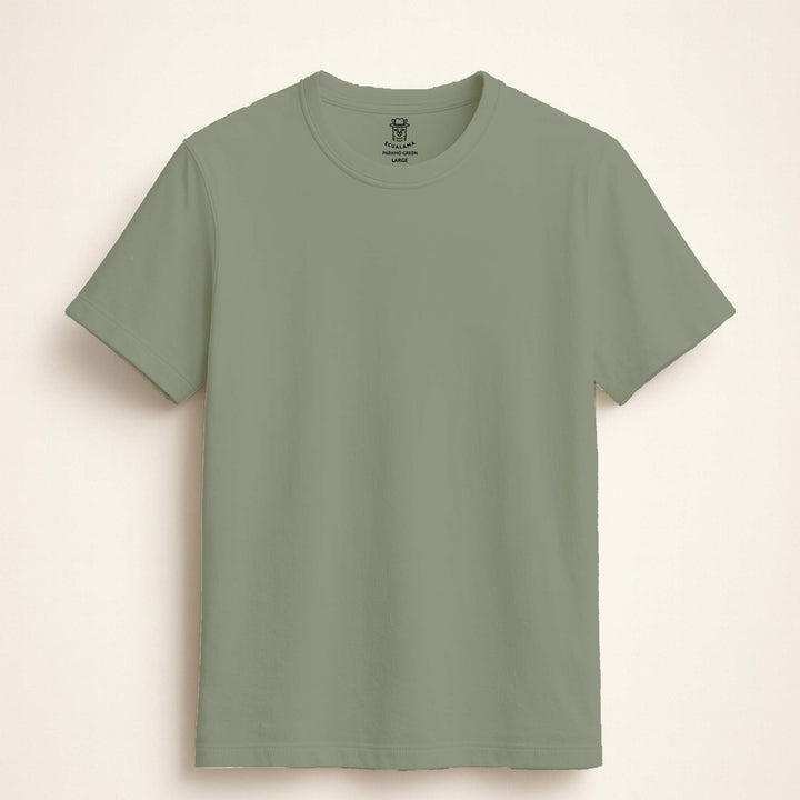 Green t-shirt on a beige background