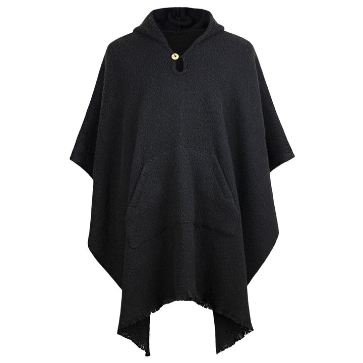 A black poncho with a hood and a single wooden button, featuring a front pocket and frayed edges. It is displayed on a plain white background.