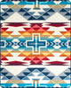 Colorful geometric patterns featuring crosses, triangles, and stripes, arranged in symmetrical fashion on a textile. The design includes blue, red, yellow, and orange shades, creating a vibrant effect.