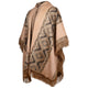 A beige and brown poncho features a diamond pattern and fringe along the edges, draped on a stand, set against a plain white background.