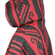 Hooded poncho with geometric red and black patterns, displaying bold, angular designs. The focus is on the hood and upper section against a plain white background.