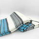 Aychapicho baby alpaca wool blanket – a folded blanket with horizontal blue, gray, and white stripes lies on a plain white background, showcasing its soft texture and pattern
