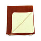 Folded blanket featuring a brown exterior and a cream interior, with one corner turned over. It is placed against a plain white background.
