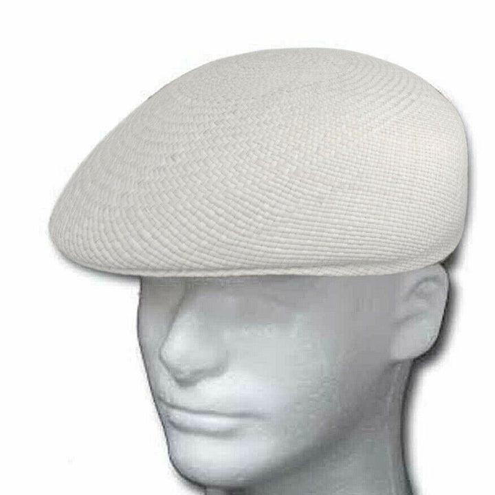 A white, textured flat cap rests on a mannequin head, set against a plain white background, showcasing its woven pattern and classic style.