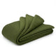 A neatly folded, olive-green wool blanket lies on a plain white background, showcasing its texture and soft appearance.