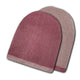 Two folded soft-focus beanies overlap, showing textured knit patterns. The front beanie is a rich maroon, while the back one is light beige. They rest on a white background.