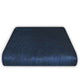 Alpamalag baby alpaca wool blanket – a rectangular, dark blue cushion lies flat, showcasing a textured surface. The cushion is set against a plain white background, emphasizing its soft and smooth appearance