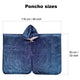 Poncho with hood laying flat, featuring button closures; measurements shown are 118 cm (46 inch) width and 83 cm (33 inch) height. Text displays Poncho sizes.