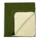 A thick, two-tone blanket with a green exterior and beige interior is neatly folded. One corner is flipped over, revealing the contrasting inner side, against a plain white background.