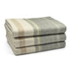 Deleg baby alpaca wool blanket – three folded blanket in gray and beige are stacked neatly on a plain white surface, showcasing their striped pattern in a simple, clean arrangement