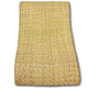 A rectangular woven mat with a herringbone pattern, crafted from light brown straw-like material, lies flat against a white background. There is no text visible.