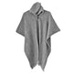 Llama Wool Hooded Poncho – a gray, woolen poncho with a buttoned neckline is hung against a plain white background, showcasing its soft texture and simple design