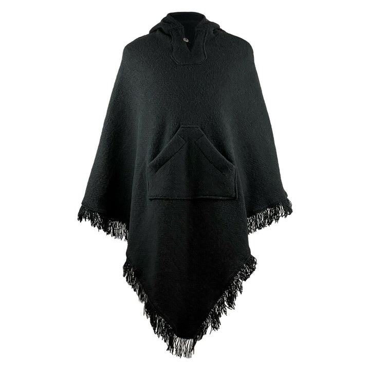 A black fringed poncho hangs motionless, featuring a central kangaroo pocket and hood against a plain background.