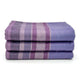 Chuquipata baby alpaca wool blanket – three folded, fluffy purple blankets with horizontal stripes are stacked on top of each other against a white background