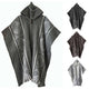A hooded poncho features geometric patterns, with a wooden button at the neck, displayed in gray, brown, and white variations, against a plain background.