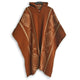 A brown wool poncho with geometric patterns hangs from a black hanger. It features a hood and a wooden button at the neck, set against a plain white background.
