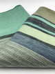 Saquisili baby alpaca wool blanket – woolen fabric displaying horizontal stripes in various shades of green and gray, lying on a white background