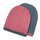 Two knit beanies overlap; one is pink with a gray band, and the other is gray with a subtle pink accent. The background is plain white.