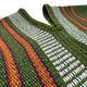 A green knitted sweater with a V-neck displays alternating vertical stripes of white and warm colors, including red and orange, against a simple background.