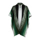 Poncho with a hood, draping, showcasing a gradient from dark green to light gray. Intricate woven patterns run vertically along the edges, with a button closure at the neck. Plain background.