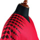 Red fabric with black dotted pattern drapes over a black dress form; the wooden neck stand contrasts with the garment's vibrant hue, highlighting a possible clothing design setting.