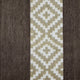 A central vertical stripe features a geometric pattern with diamond shapes in white and tan colors, bordered by solid dark brown areas on both sides.