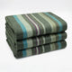 Jambue baby alpaca wool blanket – three folded blankets display dark green, light green, blue, and purple stripes, stacked neatly on a plain white background