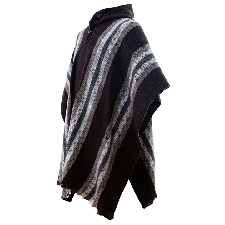 A woolen poncho with dark brown and gray diagonal stripes is draped loosely. It features a buttoned neckline and hangs against a plain white background.