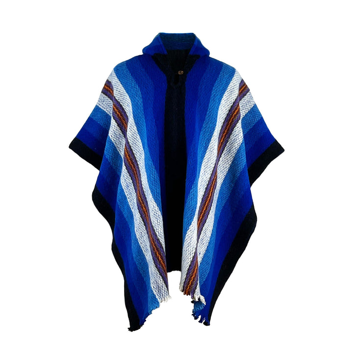 Wuachapa llama wool hooded poncho – a vibrant poncho hangs with a pattern of blue, white, black, and brown stripes. It features a high collar and is displayed against a plain white background