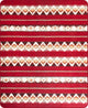 A colorful rug displays geometric diamond patterns and horizontal stripes, predominantly in red, brown, and cream colors, creating a vibrant and symmetrical design.
