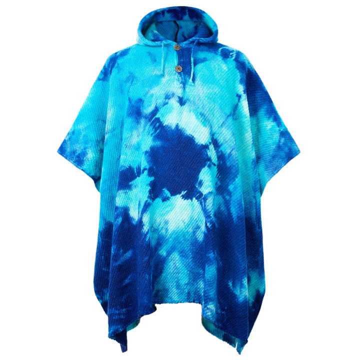 A blue tie-dye poncho with a hood and two buttons at the neck is displayed on a plain white background, showcasing its vibrant, abstract pattern.
