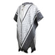 A hooded poncho features grey and white geometric patterns with a central button closure. It drapes elegantly, creating a cozy appearance, set in a plain, neutral background.
