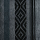 Nambija lightweight alpaca wool hooded poncho – a textile features alternating patterns of vertical stripes and geometric diamond shapes in shades of black and gray, creating a visually striking design