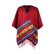 A red poncho featuring black dot patterns and vibrant geometric motifs, including yellow and blue designs, with fringe detailing at the bottom, displayed against a plain white background.