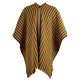Poncho displaying diagonal yellow, white, and brown stripes hangs freely against a plain background. The fabric drapes symmetrically, with fringed edges at the bottom.